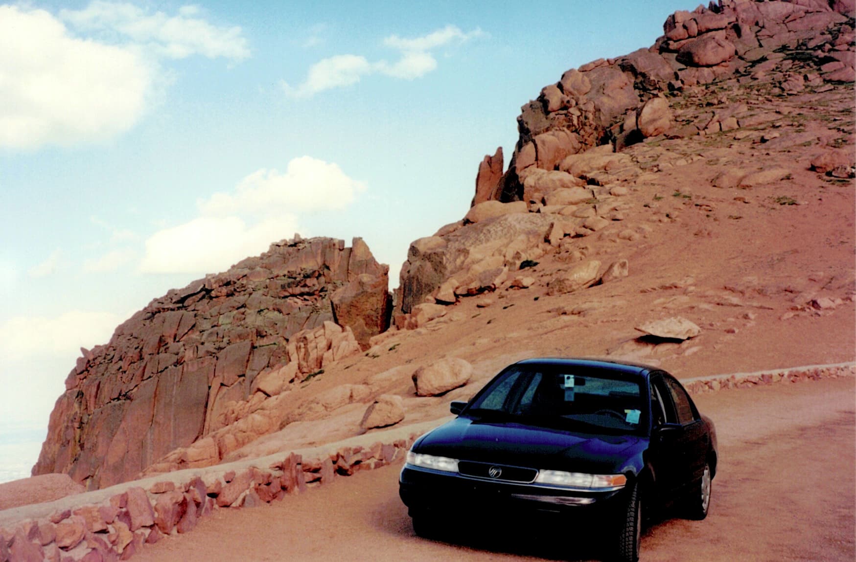 Doug Convente's Mercury Mystique sedan on Pikes Peak Highway.